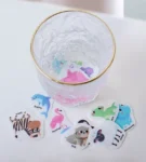 10. Kids’ handheld jelly sticker book – Vehicles
